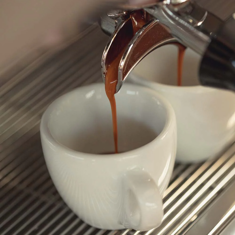Italian espresso pouring in cups
