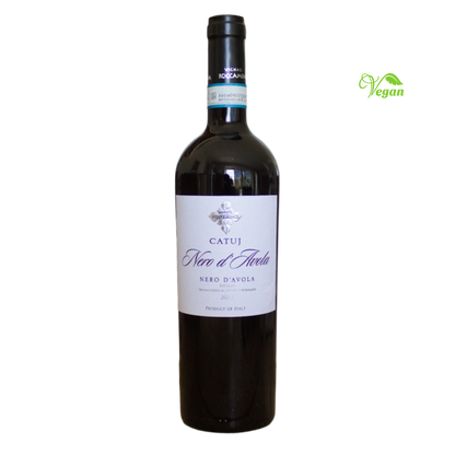 A bottle of Roccamena Nero d'Avola Catuj 2023 red wine with a label indicating it is a product from Sicily, Italy.