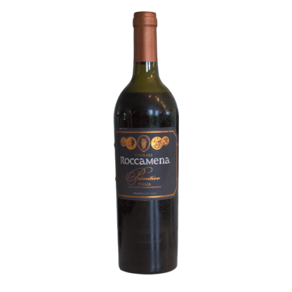 A bottle of Roccamena Primitivo 2021 wine with a label indicating it is a product from Italy, specifically Apulia region. The bottle is upright and the wine color is red.