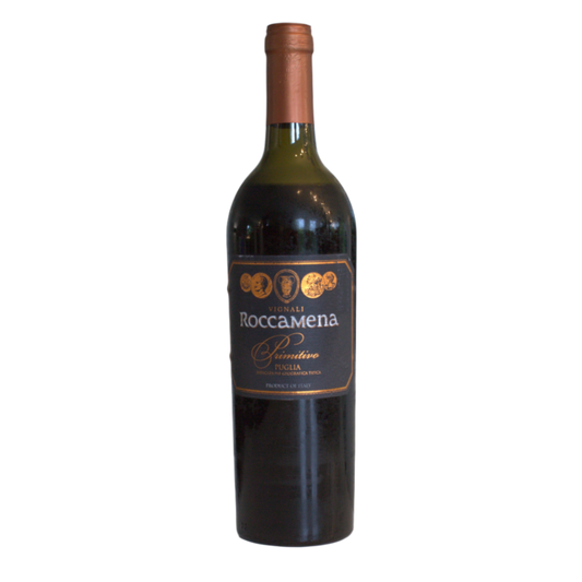 A bottle of Roccamena Primitivo 2021 wine with a label indicating it is a product from Italy, specifically Apulia region. The bottle is upright and the wine color is red.