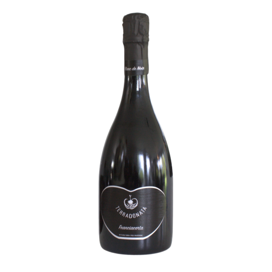 A bottle of Terra Donata Blanc de Noirs sparkling wine with a label that includes the brand name and the word 'Franciacorta'.
