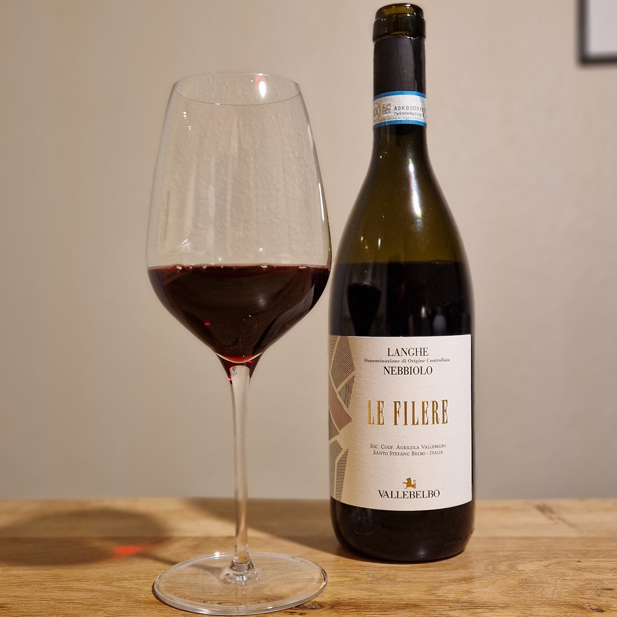 Elegant glass of Langhe Nebbiolo red wine - Garnet hues and fine tannins